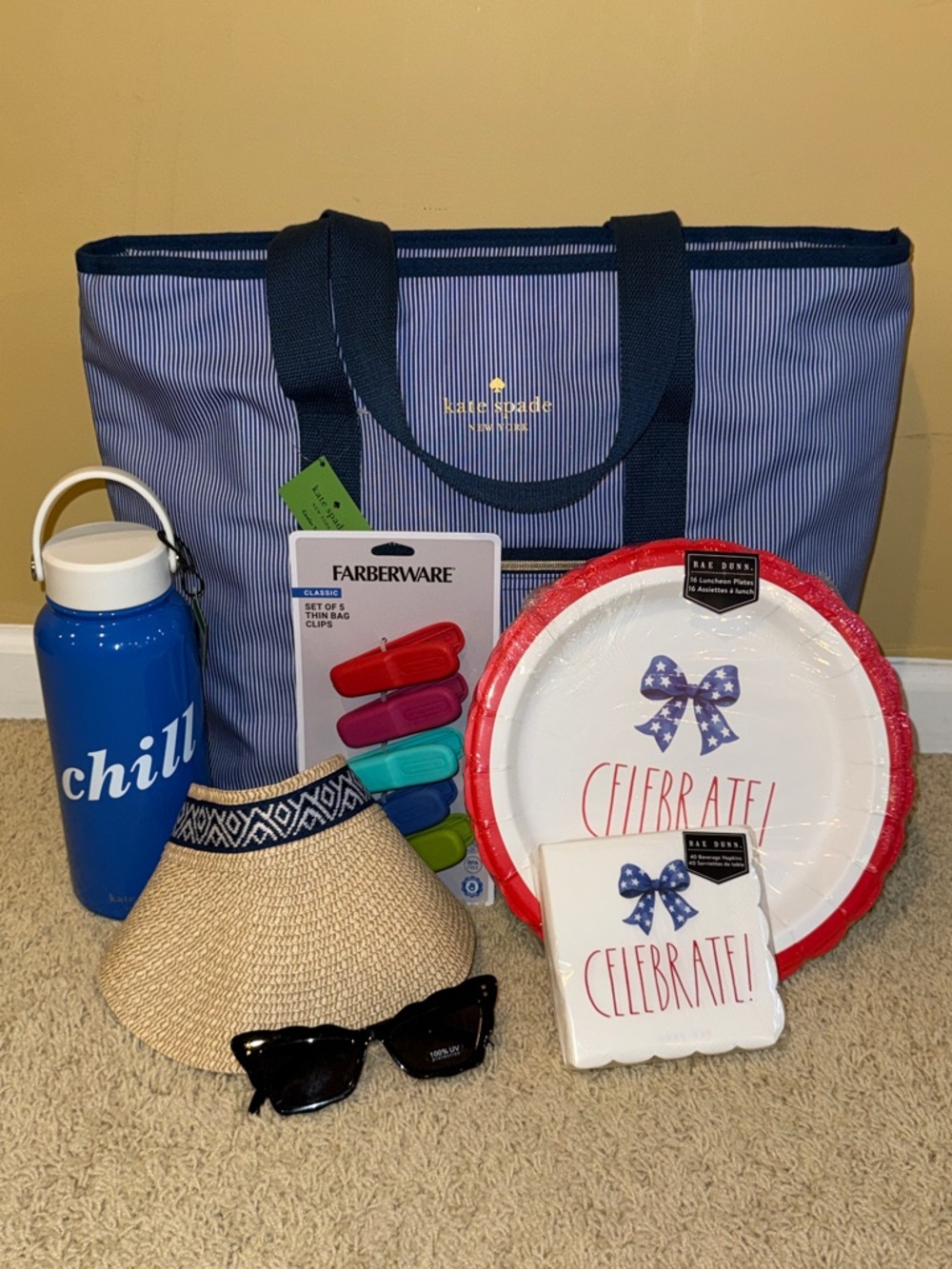 kate spade navy and white striped tote with gold logo
